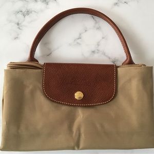 Authentic Longchamp Le Pliage used beige tote short handles